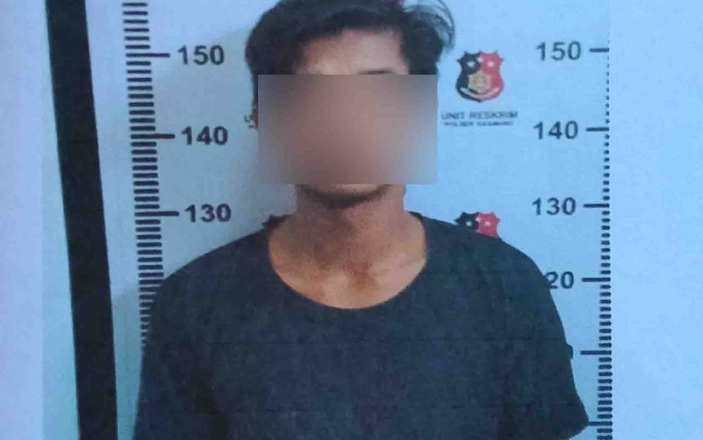 Gusti Murjani alias Danny, tersangka kasus penganiayaan.