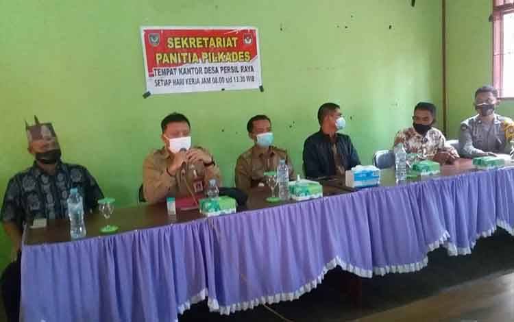 Pj Kades Persil Raya pada saat kegiatan evaluasi persiapan pelaksanaan Pilkades Persil Raya