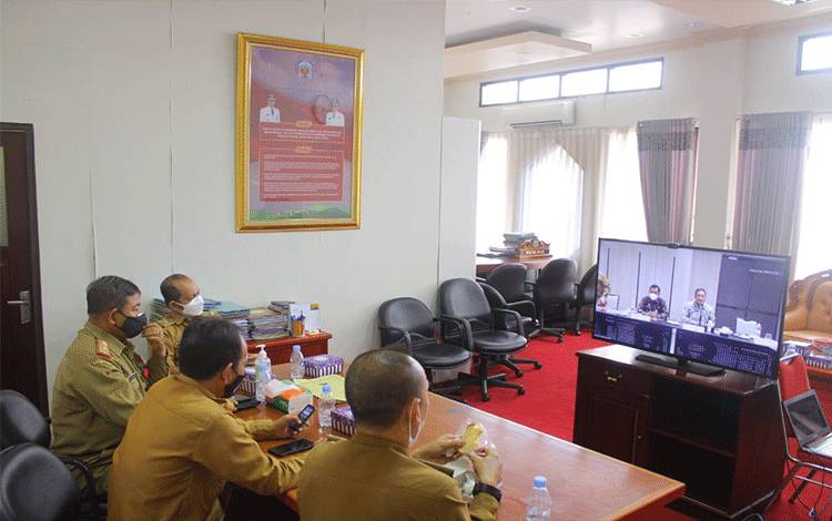 Pelaksanaan rakor kesiapan Pemilu serentak secara virtual yang diikuti Pemerintah Kabupaten Murung Raya.