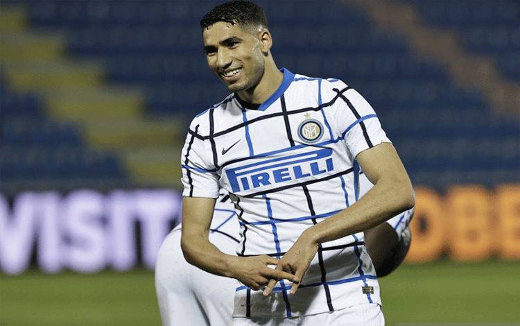 Bek Inter Milan asal Maroko, Achraf Hakimi.(REUTERS/CIRO DE LUCA)