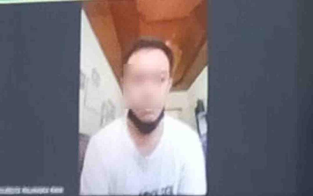 Terdakwa saat menjalani Sidang secara virtual di pengadilan Negeri Palangka Raya