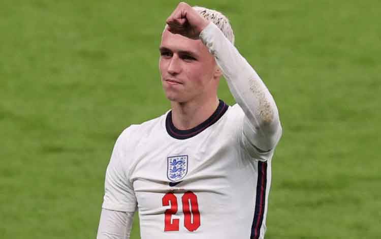 Gelandang Timnas Inggris Phil Foden saat pertandingan semifinal UEFA EURO 2020 melawan Denmark di Stadion Wembley di London pada 7 Juli 2021. (Photo by Catherine Ivill / POOL / AFP) (AFP/CATHERINE IVILL)