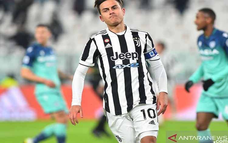 Penyerang Juventus Paulo Dybala merayakan golnya ke gawang Udinese dalam laga lanjutan Liga Italia di Stadion Allianz, Turin, Italia, Sabtu (15/1/2022) waktu setempat