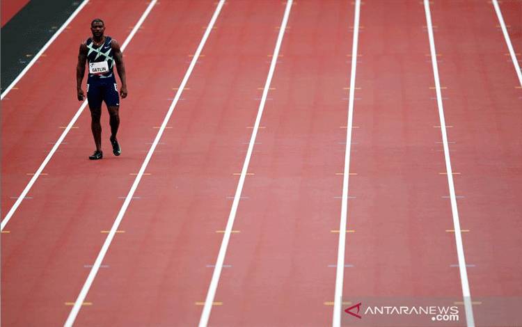 Arsip - Justin Gatlin dari Amerika Serikat sebelum putaran 1 putaran Emas World Athletics Continental Tour 100m putra pada Tokyo 2020 Olympic Games Test Event bidang Athletics di Olympic Stadium, Tokyo, Jepang Minggu (9/5/2021). REUTERS/Kim Kyung-Hoon/AWW/sa.