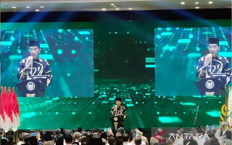 Presiden RI Joko Widodo menyampaikan sambutan saat menghadiri pembukaan Rapat Koordinasi Nasional dan Musyawarah Dewan Partai Bulan Bintang di Jakarta, Rabu (11/1/2023). (ANTARA/Gilang Galiartha)