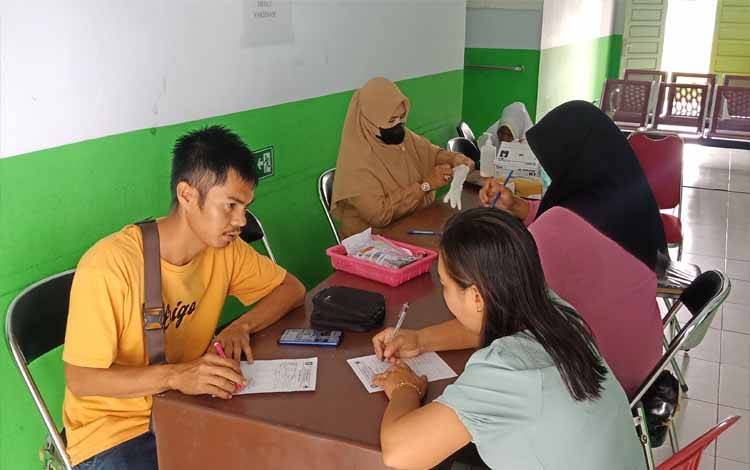 Layanan vaksinasi covid-19 di Puskesmas Baamang II, Selasa 31 Januari 2023 (FOTO: DEWIP)