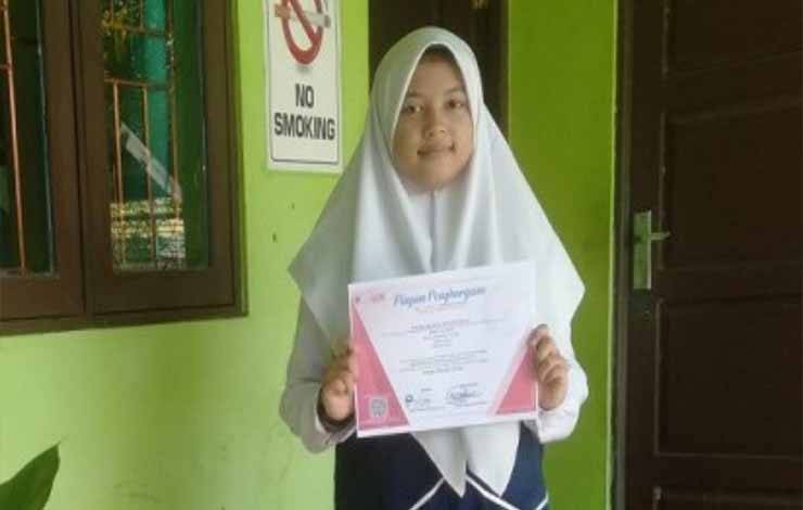 Pelajar MTsN 1 Kapuas yang berhasil raih juara pada Ajang OSAI tahun 2023. (FOTO: IST)