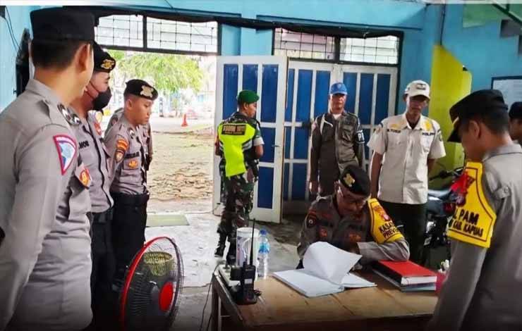 Suasana saat personel gabungan patroli menyasar tempat penyimpanan logistik Pemilu di Kapuas, Kamis, 7 Desember 2023. (FOTO: IST)