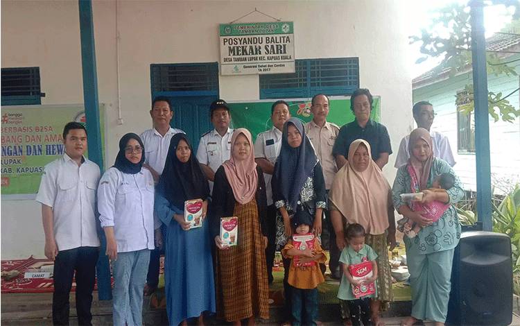 Camat Kapuas Kuala, Nurcahyono saat hadiri peluncuran rumah pangan B2SA Desa Tamban Lupak. (FOTO: IST)