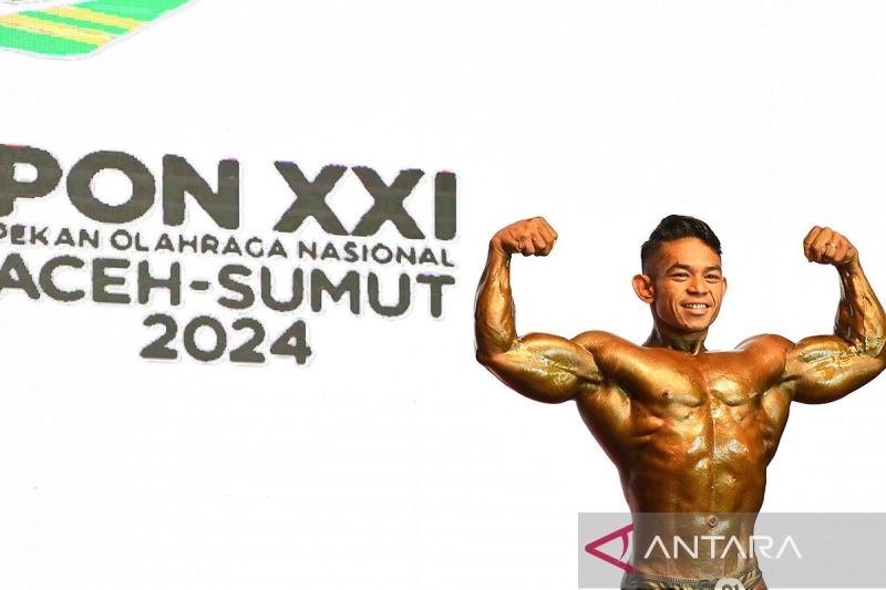 Atlet binaraga Kalimantan Timur Robi Yanur tampil pada kategori Men's Athletics Physique pada PON Aceh-Sumut XXI 2024 di Medan, Sumatra Utara, Selasa (10/9/2024). Robi Yanur berhasil meraih medali perak, sedangkan medali emas diraih atlet binaraga Daerah Istimewa Yogyakarta Dirilis Dwi March Woda dan perunggu diraih atlet Jawa Barat Yona Riyana Pura. ANTARA FOTO/Jessica Wuysang/Spt.