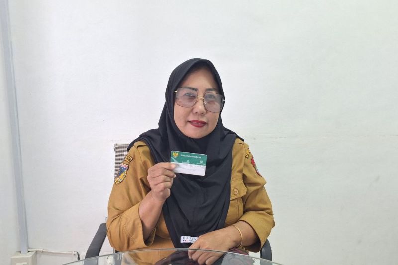 Sriwahyuni (47), seorang Aparatur Sipil Negara (ASN) yang bertugas di Dinas Sosial Kabupaten Banggai, Sulawesi Tengah, merasa sangat puas dengan pelayanan yang diterimanya di Puskesmas Kampung Baru. ANTARA/HO-BPJS KESEHATAN LUWUK