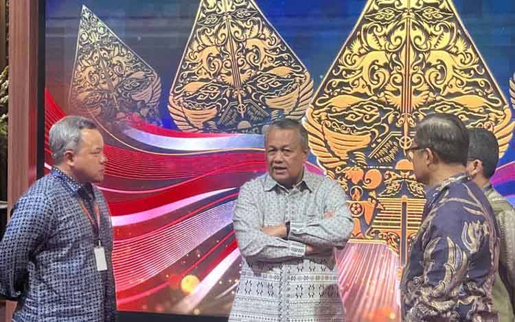 Gubernur Bank Indonesia Perry Warjiyo usai mengikuti acara Pertemuan Tahunan Bank Indonesia (PTBI) 2024 di Gedung BI, Jakarta, Jumat (29/11/2024). ANTARA/M. Baqir Idrus Alatas (Muhammad Baqir Idrus Alatas)