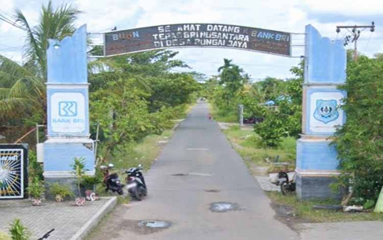 Gerbang selamat datang Desa Bungai Jaya. Desa Bungai Jaya memperoleh nilai 94 dengan kategori AA. (FOTO: IST)