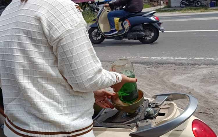 Ilustrasi mengisi bahan bakar eceran (Foto:MARINI