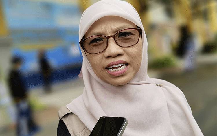Kepala Dinas Ketenagakerjaan dan transmigrasi Pulang Pisau saat diwawancara terkait pelaksanaan hari Buruh Internasional, Jumat, 1 Mei 2026. (FOTO : RETHA)