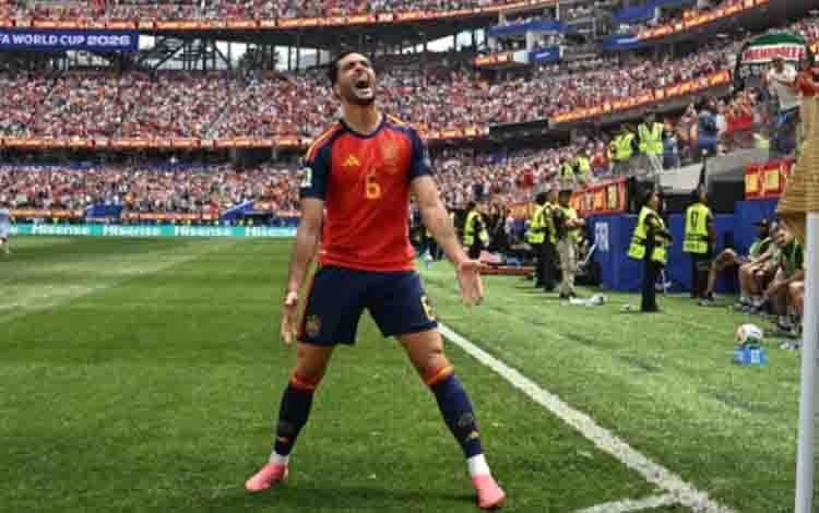 Gelandang Spanyol Mikel Merino meluapkan kegembiraannya setelah mencetak gol kemenangan Spanyol dalam pertandingan perempat final Piala Dunia 2026 melawan Belgia di Los Angeles Stadium, Inglewood,. California, Amerika Serikat, pada 10 Juli 2026. AFP/PAUL ELLIS.