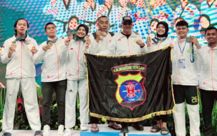 Kontingen Taekwondo Polda Kalteng saat berfoto bersama. (Foto : IST)