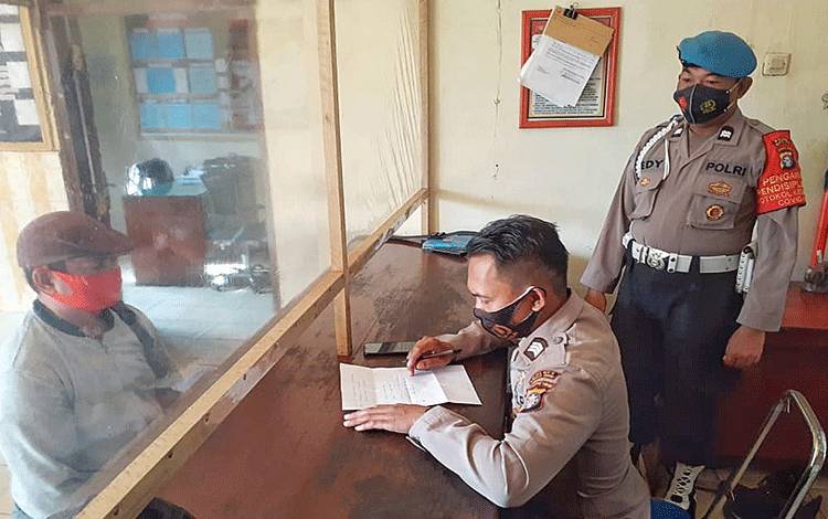Polsek Dusun Tengah Tingkatkan Protokol Kesehatan dalam Pelayanan Publik