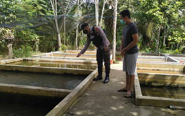 Dukung Ketahanan Pangan, Polsek Danau Sembuluh Sambangi Pembudidaya Ikan