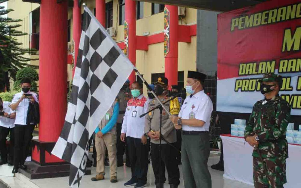 Sekda Kalteng Lepas Pembagian Masker Pendisiplinan Protokol Kesehatan Covid-19