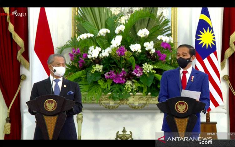 Presiden Joko Widodo dan PM Malaysia Bahas Perlindungan Pekerja Migran