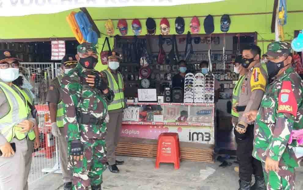 Koramil 1016-03 Sepang Sosialisasi Protokol Kesehatan Kepada Pedagang Pasar Kelurahan Kampuri