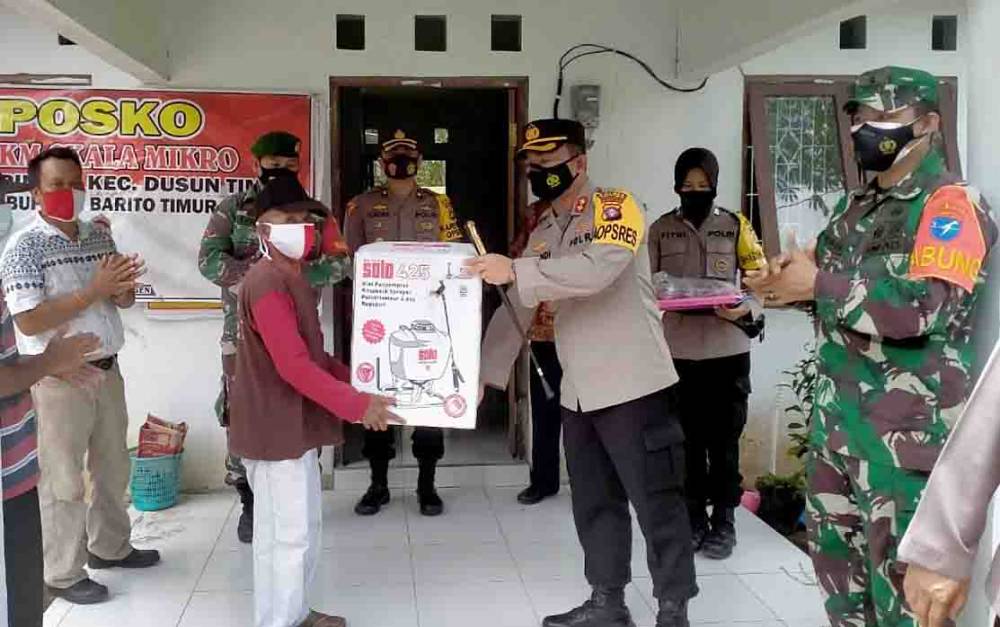Tingkatkan Penanggulangan Covid-l9, Kapolres Barito Timur Cek Posko PPKM Skala Mikro