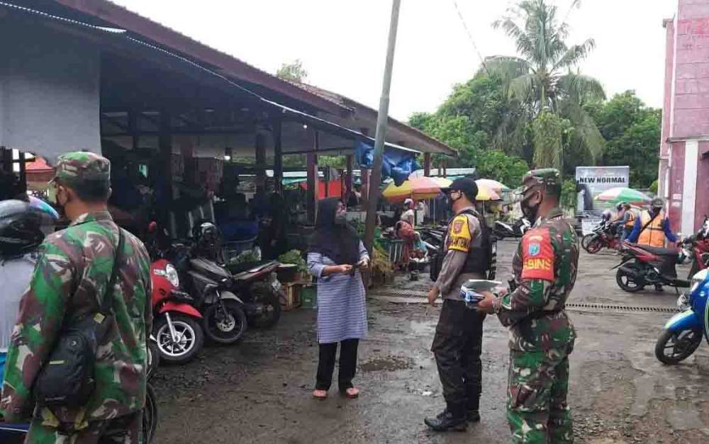 Tingkatkan Disiplin Prokes,  Polsek Seruyan Hilir dan Koramil Lakukan Patroli Gabungan