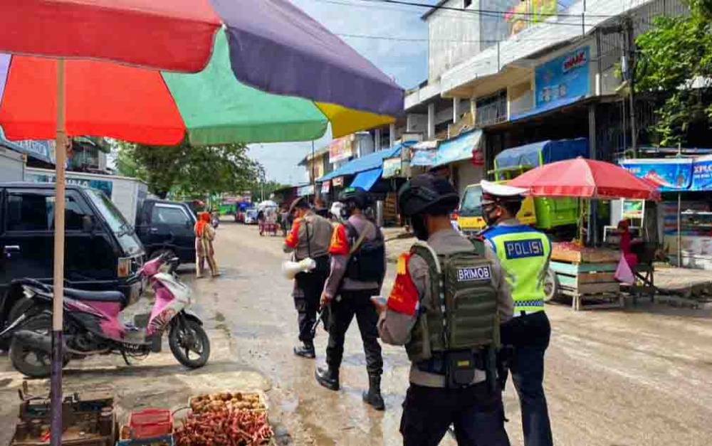 Tim Yustisi Polda Kalteng Terus Ingatkan Masyarakat Terapkan Prokes