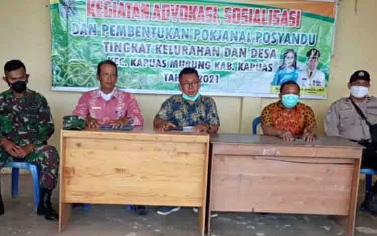 Bhabinkamtibmas Polsek Kapuas Murung Hadiri Pembentukan Pokjanal Posyandu