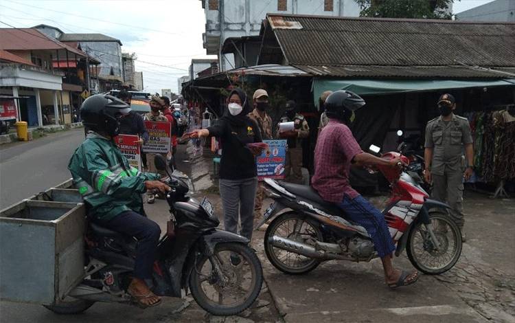 Polres Seruyan Bersama Satgas Yustisi Lakukan Pendisiplinan Prokes di Kuala Pembuang  ?