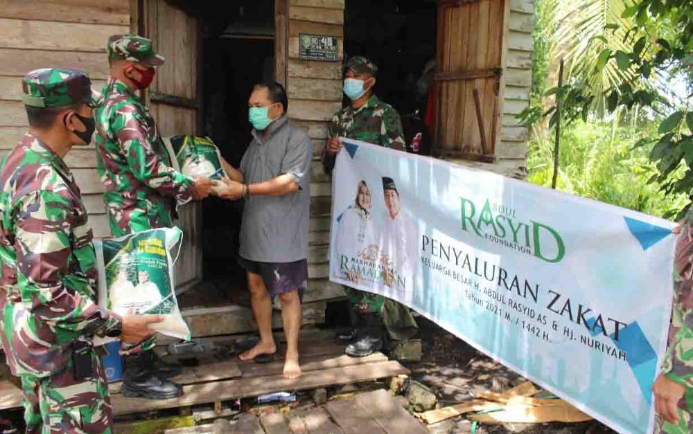 Kodim Palangka Raya Bersama Abdul Rasyid Foundation Distribusikan Bantuan Sembako