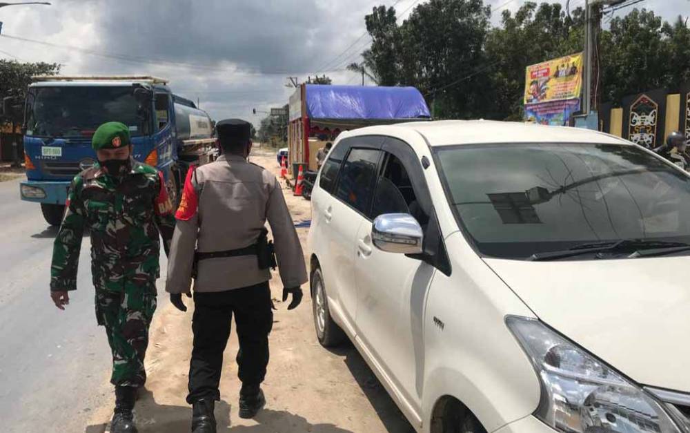 Jelang Pemberlakuan Larangan Mudik Lebaran, Petugas Mulai Aktif Jaga di Pos Penyekatan