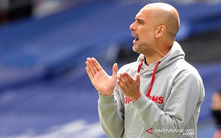 Guardiola Desak Fans untuk Divaksin dan Kenakan Masker