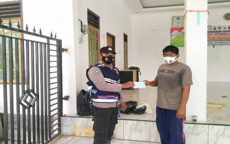 Bhabinkamtibmas Sambangi Warga Desa Tawan Jaya Sampaikan 3 M