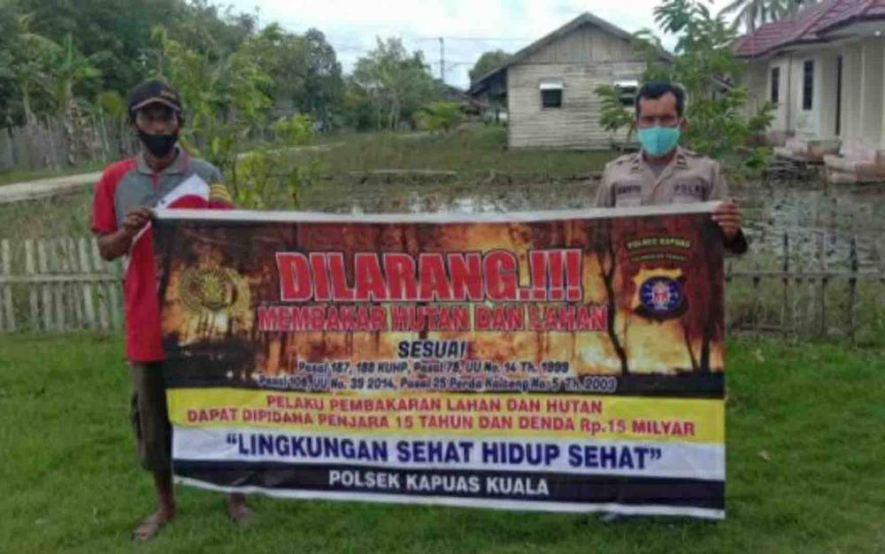 Sambangi Warga, Personel Polsek Kapuas Kuala Ingatkan Warga Cegah Karhutla