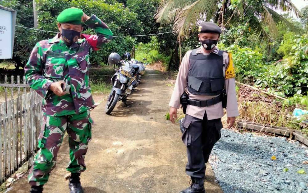 TNI Polri di Kecamatan Kapuas Timur Bersinergi Patroli Karhutla