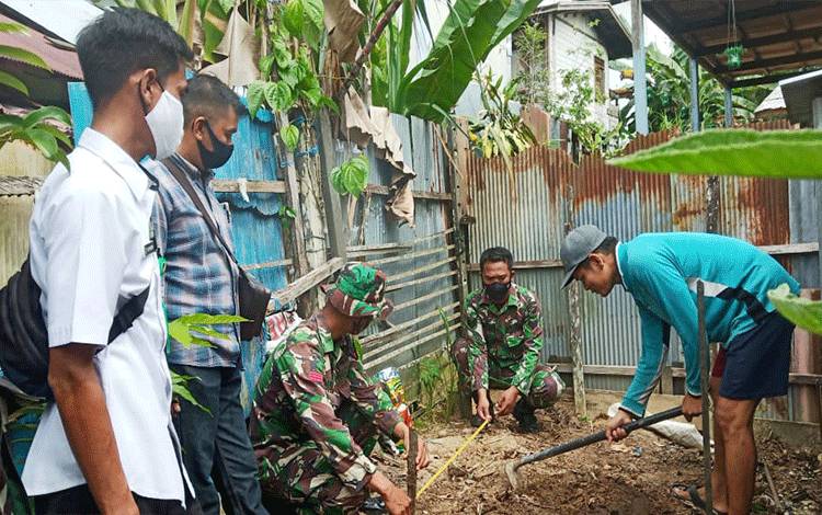 Satgas TMMD Laksanakan Kesehatan Lingkungan