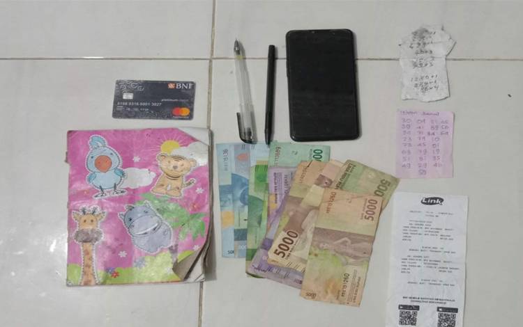 Seorang Pria Diamankan karena Judi Togel Online
