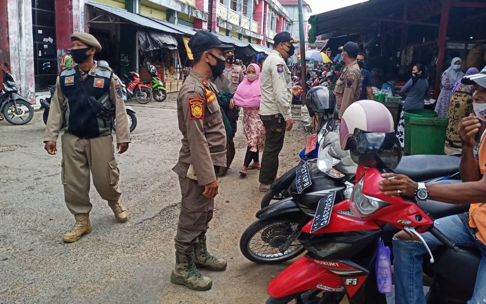 Polres Seruyan dan Satpol PP Bersinergi Tegakkan Protokol Kesehatan