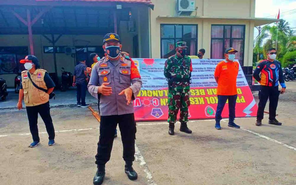 Kapolsek Pahandut Imbau Petugas Tetap Humanis Tindak Pelanggar Prokes
