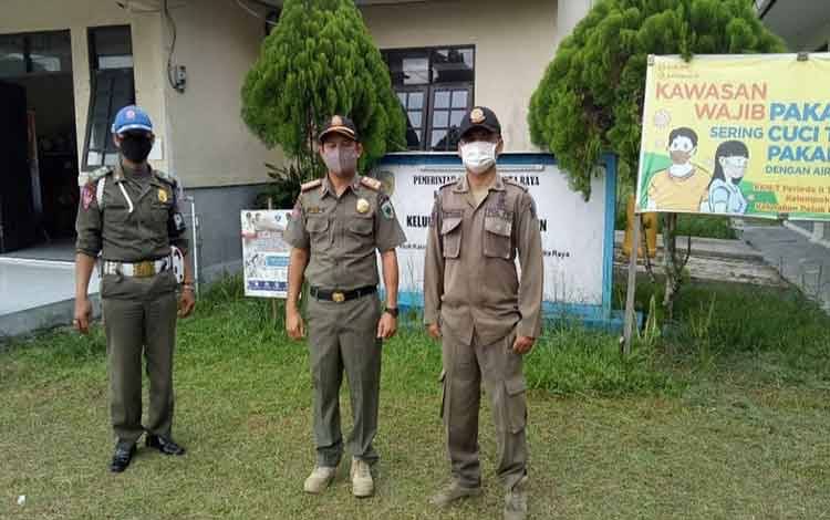 Kasatpol PP Palangka Raya Kerahkan Personel Dampingi Nakes di Kecamatan Pahandut