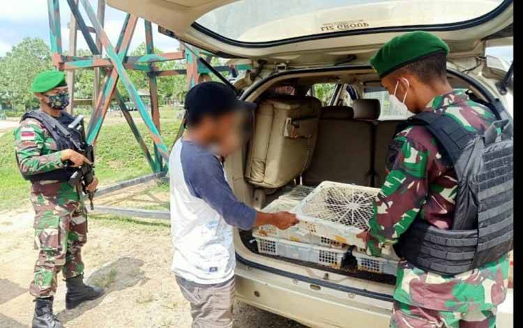 Satgas Pamtas 643 Wanara Saksi Gagalkan Penyelundupan Ratusan Satwa