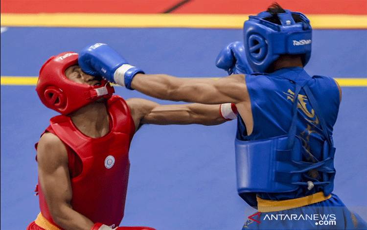 Yusuf Widianto Pertahankan Gelar Wushu Sanda 56 Kg