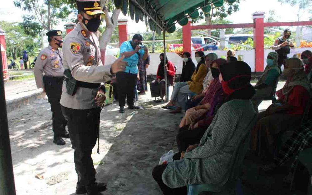 Kapolres Seruyan Apresiasi Antusiasme Warga Desa Bangun Harja Ikuti Vaksinasi