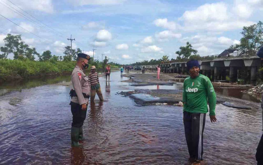 Polisi Pantau Debit Air di Bukit Rawi