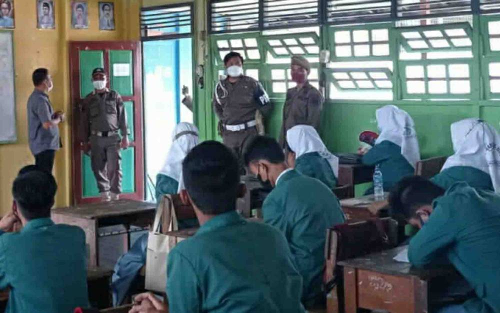 Satpol PP dan Damkar Kapuas Cek Penerapan Prokes PTM