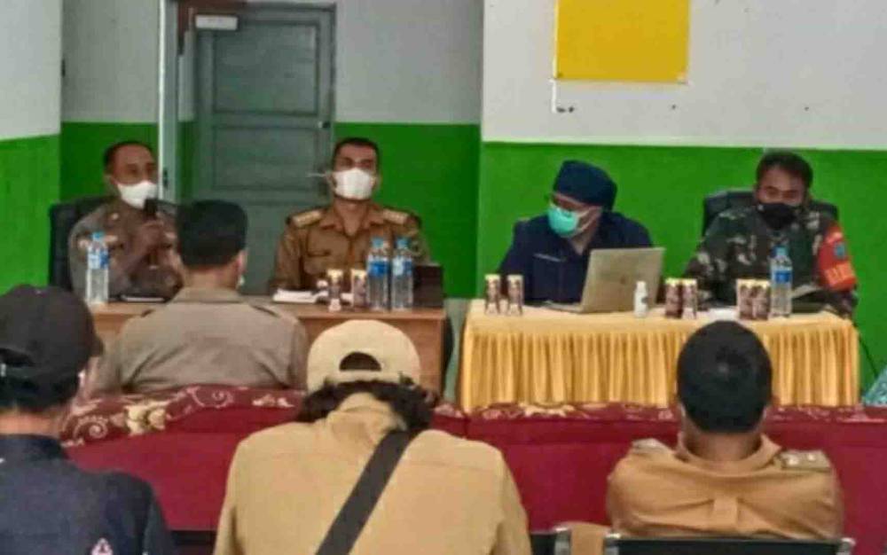 Kapolsek Mantangai Hadiri Rapat Lintas Sektor Bahas Percepatan Vaksinasi Covid-19