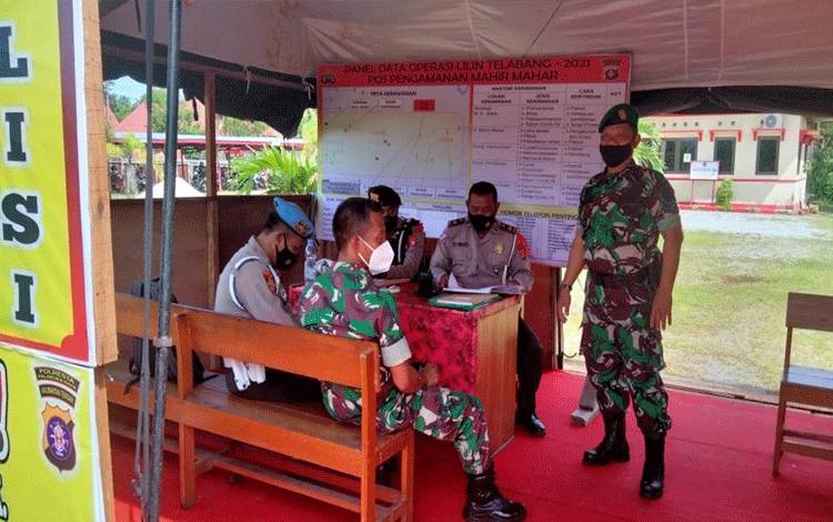 Aparat Gabungan Berjaga di Pos Pengamanan Operasi Lilin Telabang