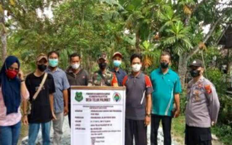 Polsek Pulau Petak Dampingi Monitoring Pembangunan di Desa Teluk Palinget